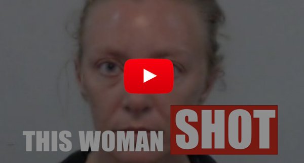 A blurred mugshot of a woman with text overlay reading "THIS WOMAN SHOT" and a play button icon in the center, hinting at an AC Meltdown story where a woman shoots ex over an air conditioning unit dispute.