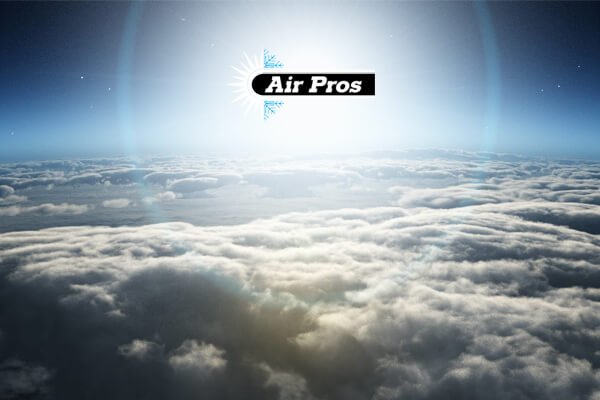 View of clouds from above with the sun shining in the background and the text "Air Pros" centered at the top, highlighting expertise in air conditioning systems since 2010—a tricky year for many in the industry.