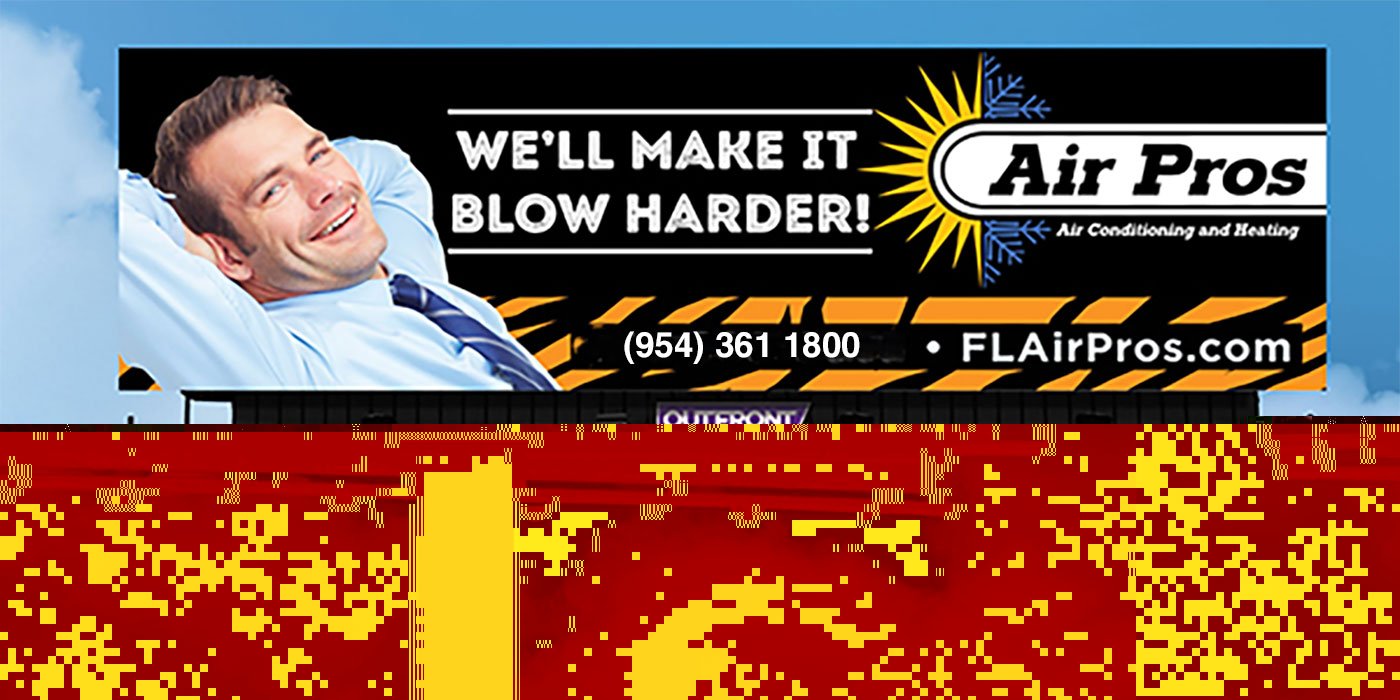 A billboard in Boca Raton advertises Air Pros air conditioning with the slogan “We’ll make it blow harder!” alongside a smiling man, company logo, phone number, and website.